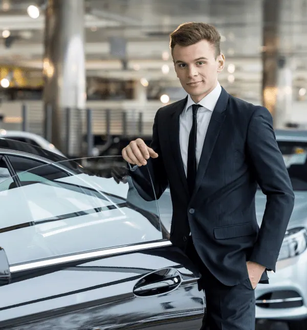 A member of the DriveSure team in the showroom